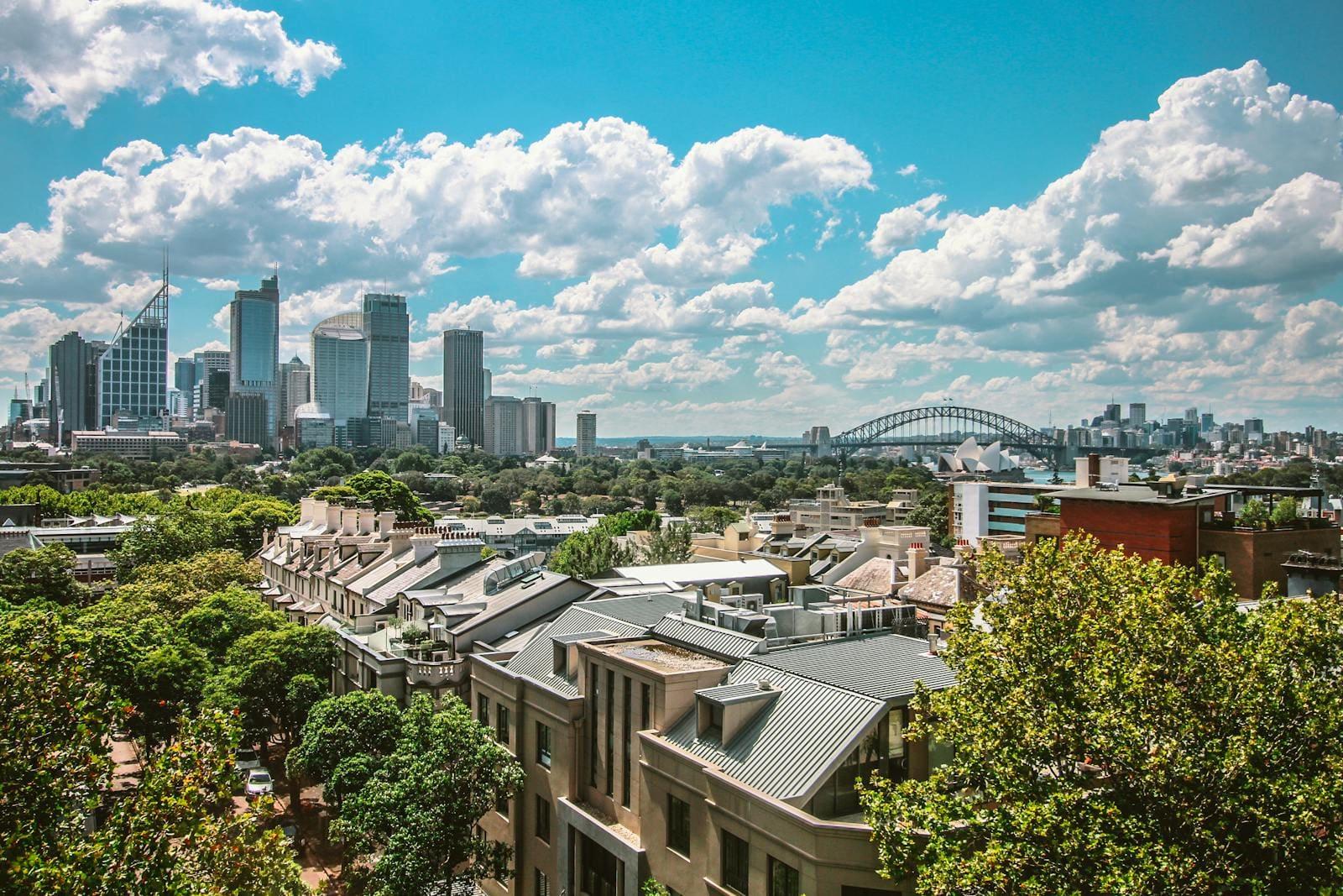 A view across Sydney rooftops to the CBD, the Harbour Bridge and the Opera House
